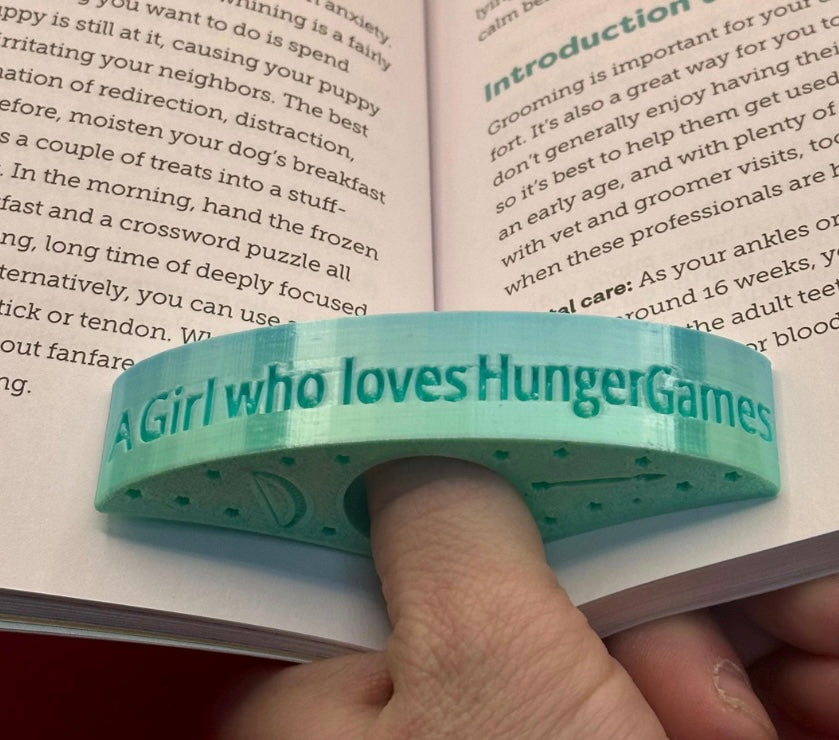 Fan Inspired Hunger Games Page Holder